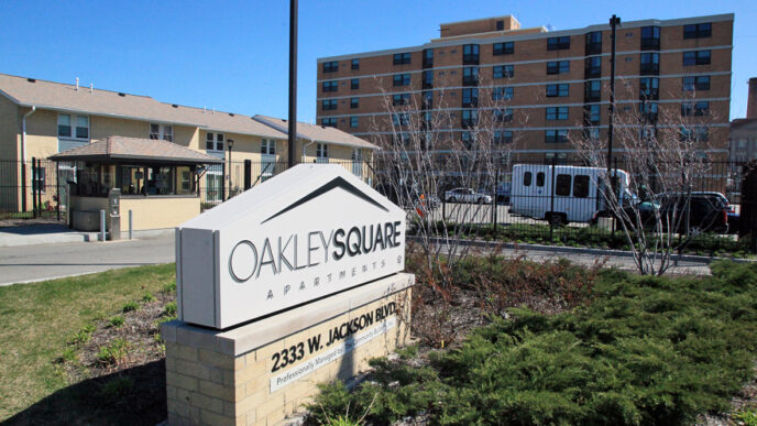 Entrance to the Oakley Square apartment complex|Nurse practitioner Terry Gallagher takes a patient's blood pressure|Rose Mabwa and Oakley Square residents in conversation.